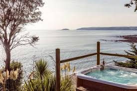 Want A Coastal Cottage With A Hot Tub