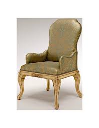 golden armchair with nail head trims