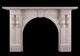 A Carved Arched Marble Fireplace