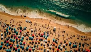 busy beach stock photos images and
