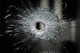 bullet hole in glass 