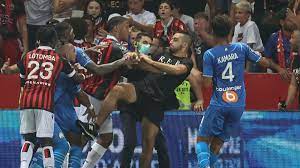 The game between nice and marseille on sunday evening ended in chaos as — following disturbances on the pitch involving home fans and . 385oliwdkpqybm