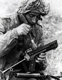 German Soldier Cleaning MP40, WW2 [795x1023] : r/MilitaryPorn