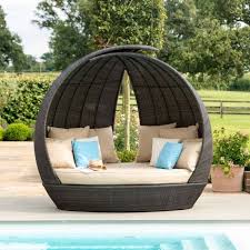 Maze Rattan Lotus Garden Daybed In Brown
