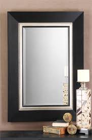 A traditional wood framed mirror gives off a rural or rustic vibe on any bathroom. Whittington Matte Black Vanity Mirror Classy Mirrors