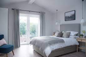 75 gray laminate floor bedroom ideas