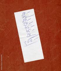 handwritten bill or receipt stock photo