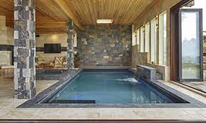 These creatively designed indoor swimming pools connect to nature and allow you to enjoy the outdoors no matter what the weather. Indoor Pool Design Installation Services Solda Pools