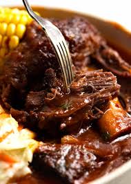 beef ribs in bbq sauce slow cooked