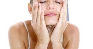 wash your face with hot or cold water