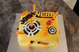 This is a diy nerf cake made with fondant and the cupcakes were homemade with nutella in the center. Nerf Cake Tejal S Kitchen