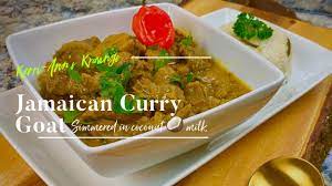 curry goat simmered in coconut milk