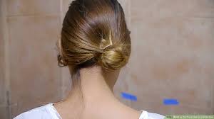 Bun hairstyles are generally understated, but if you want to inject them with a little pizzazz, perhaps you should try rocking the effortless side braid seen in this photo. 4 Ways To Do Your Hair In A Side Bun Wikihow