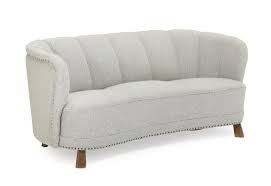 three seater sofa with stained beech