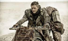 Leading us into battle was coma the doof warrior. Mad Max Fury Road Review Tom Hardy Is A Macho Mr Bean In Brilliantly Pimped Reboot Mad Max Fury Road The Guardian