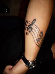 It's simply great to sport images of musical notes or musical instruments tattooed on the skin. Music Armband Tattoo Designs Arm Tattoo Sites