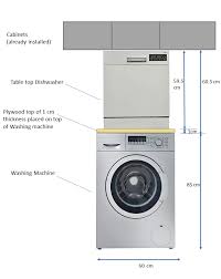 Install a cleat on the wall. How To Stack A Portable Countertop Tabletop Dishwasher On Top Of A Front Load Washing Machine Home Improvement Stack Exchange