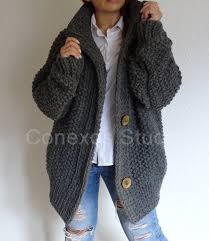 This crochet bomber jacket features signature balloon sleeves with a chunky ribbed hem. Dark Gray Oversized Cardigan Knit Cardigan Chunky Knit Etsy