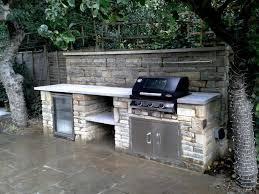 modern rustic outdoor kitchen in sw19