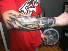 With the flag you will often see eagles, military stuff, guns and iconic symbols. Tattered American Flag Tattoo American Flag Tattoos Best Images Flag Tattoo American Flag Sleeve Tattoo American Flag Tattoo