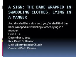 the wrapped in swaddling clothes