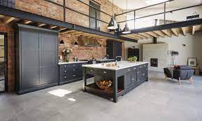 Supports simple formality, minimalism and functionality. Industrial Style Kitchen Tom Howley