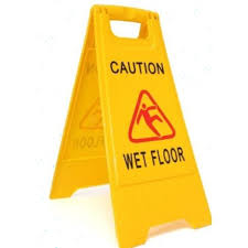 caution wet floor sign on folding a