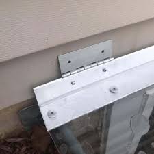 hinged egress window well covers with