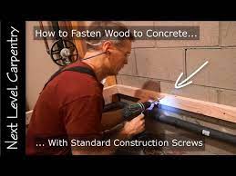 how to fasten wood to concrete with