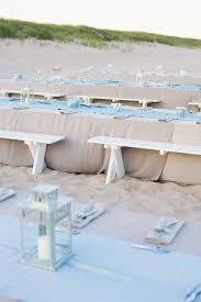 Three layered wedding cake with beach theme on table. Rustic Beach Wedding Reception On The Beach Fab Mood Wedding Colours Wedding Themes Wedding Colour Palettes