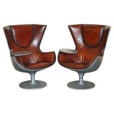 Brown Leather Eurostar Egg Armchairs By