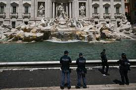 activists turn trevi fountain water black
