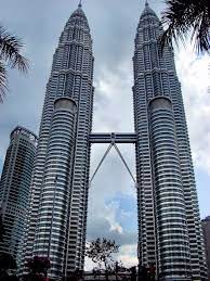 On the bottom floor of the huge complex there is a shopping centre (suria klcc) and outside you will find the large klcc park. Petronas Twin Towers In Kuala Lumpur Malaysia Encircle Photos