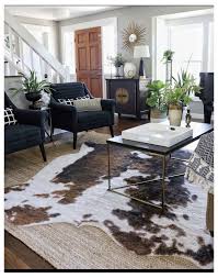 They will also offer you a perfect investment. Cowhide Over Jute Rug Planta Entre Sillones Rugs In Living Room Cowhide Rug Living Room Hide Rug Living Room