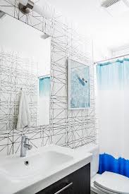 White Graphic Wallpaper In Bathroom