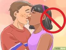 Is it okay to kiss at 14?
