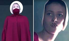 As we wait in our double line, the door opens and two more women come in, both in the red dresses and white wings of the handmaids. The Handmaid S Tale Season 3 What Was The Meaning Behind The Mouth Rings Tv Radio Showbiz Tv Express Co Uk
