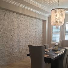 Dinning Room With Natural Stone Wall