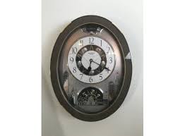 Rhythm Motion Wall Clock