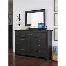 The dresser and mirror feature a warm gray finish with a white wax effect over replicated oak grain. B249 31 Ashley Furniture Brinxton Black Bedroom Dresser