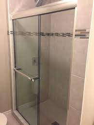 Tiled Shower With Sliding Glass Doors