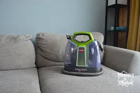 using a portable carpet cleaner
