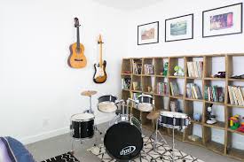 So, whether you are musician, or simply have one in the give your home's music room a strong identity as a different sort of space by choosing a strong color scheme. Music Room Beach Style Kids Orange County By Shop Skout Houzz