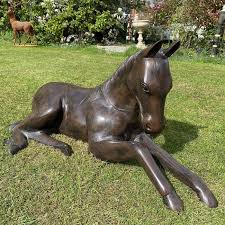 resting foal garden horse sculpture