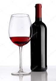 Glass With Red Wine Bottle On White