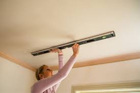 install a decorative wood ceiling
