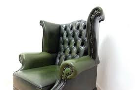 This beautiful moss green or pearl gray leather accent chair features a â€œtâ€ shaped cushion with contrast tone stitching and unique taperedwood legs. Vintage Queen Anne Style Green Leather Wingback Armchair By Chesterfield For Sale At Pamono