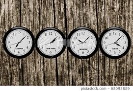 Wall Clocks On The Brown Wall Of