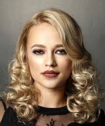 To prevent an excessive bulk these, same like long curly hairstyles, suggest layers cut in. Medium Curly Light Blonde Hairstyle