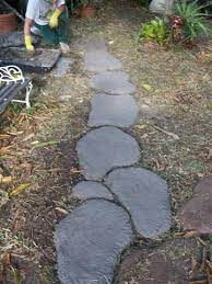 4 Concrete Hand Shaped Stone Path Ideas